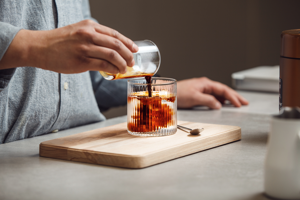 Barista preparing a cold brew espresso